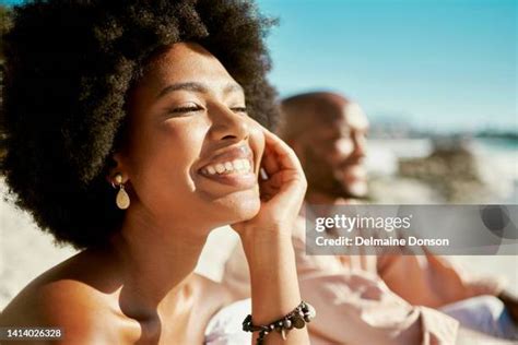 32,663 Female Sunbathing On Beach Stock Photos & High